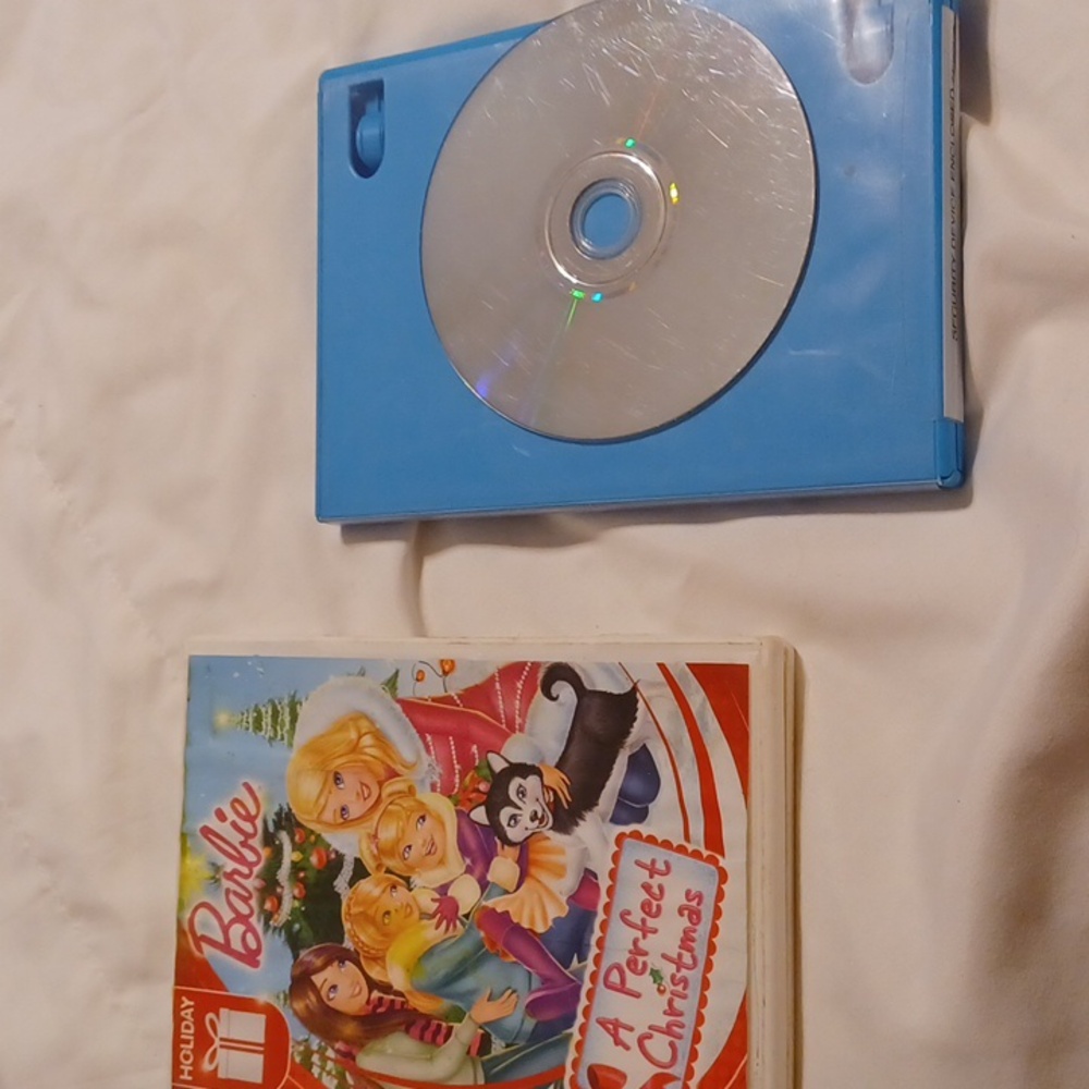 2 Christmas dvds barbie and Rudolph